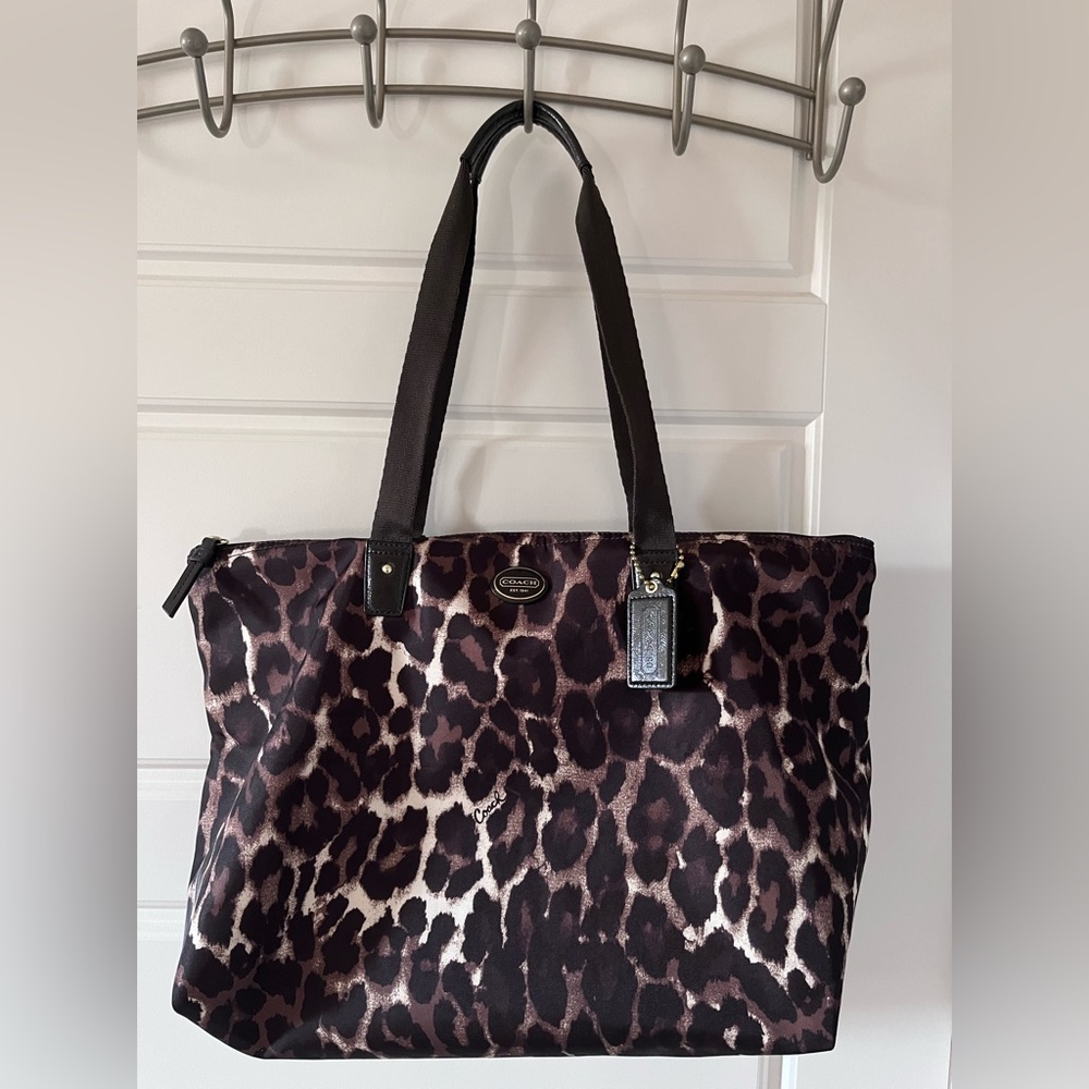 Large Coach Getaway with snap cosmetics bag